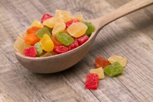 photo of fruit gummies in a spoon