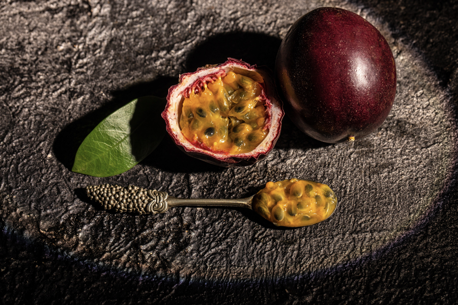 photo of Whole passionfruit and a half of maracuya Long banner format top view